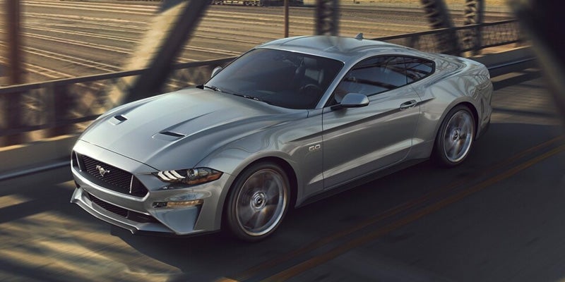 Photo of a 2024 Ford Mustang driving on the road