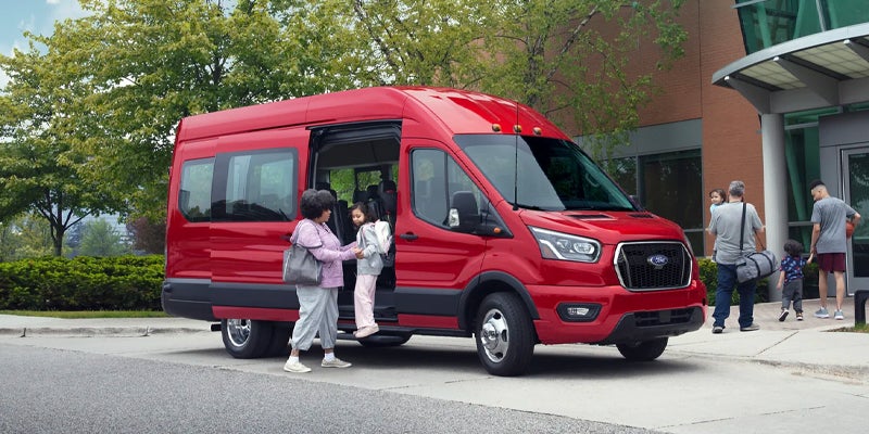 Photo of people getting out of a 2024 Ford Transit