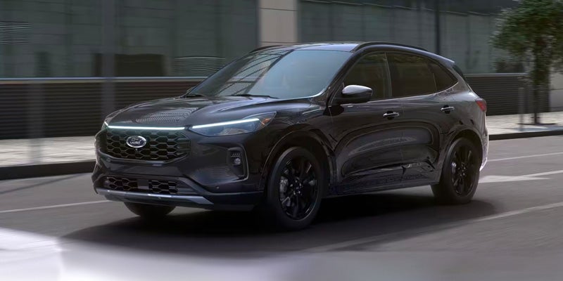 Photo of a 2024 Ford Escape Plug-In Hybrid driving on the road