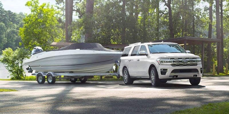 Photo of a 2024 Ford Expedition towing a boat