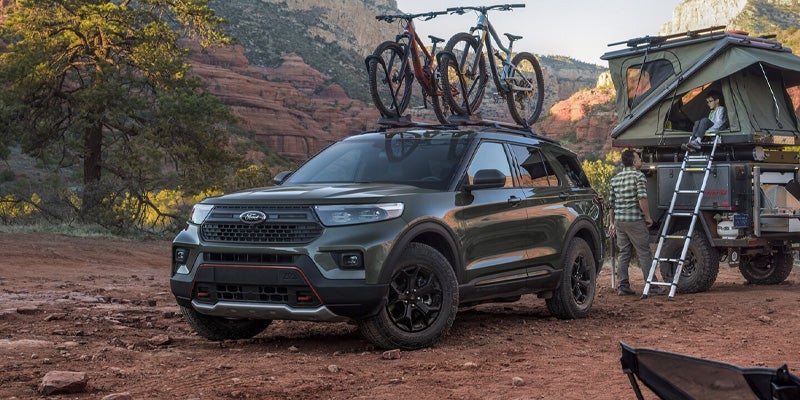 Photo of a 2025 Ford Explorer with bikes mounted on top of it