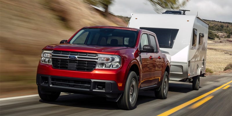 Photo of a 2024 Ford Maverick towing a trailer