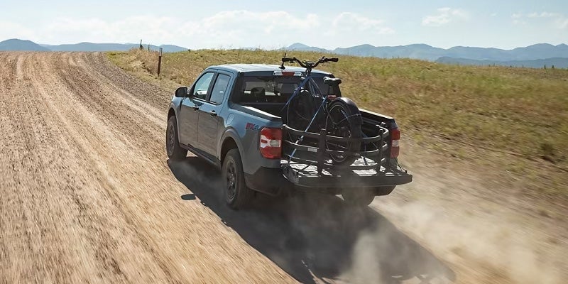 Photo of a 2024 Ford Maverick driving on a sand terrain