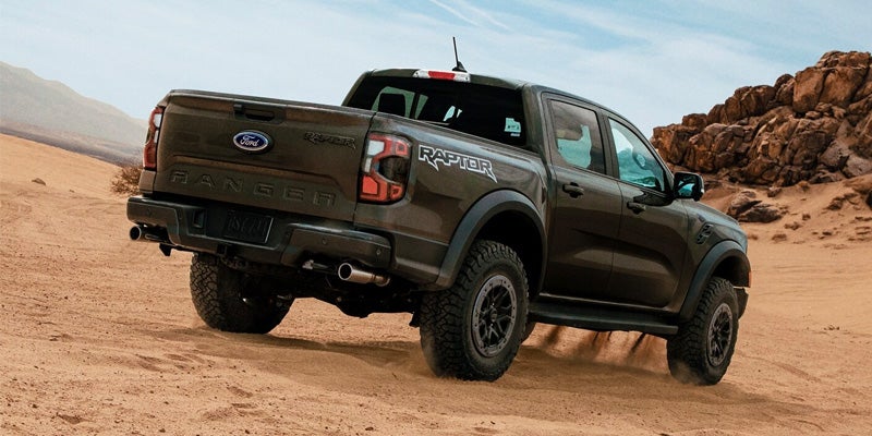 Rear view of a 2024 Ford Ranger on sand