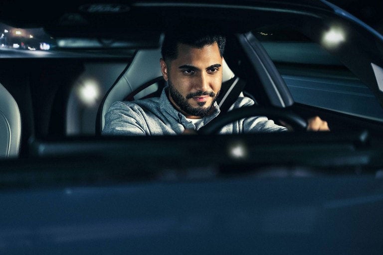 Person sitting in the driver’s seat of a parked 2024 Ford Mustang® coupe | Al Packer's White Marsh Ford in Middle River MD