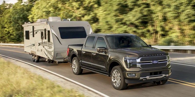 Photo of a 2025 Ford F-150 towing a trailer