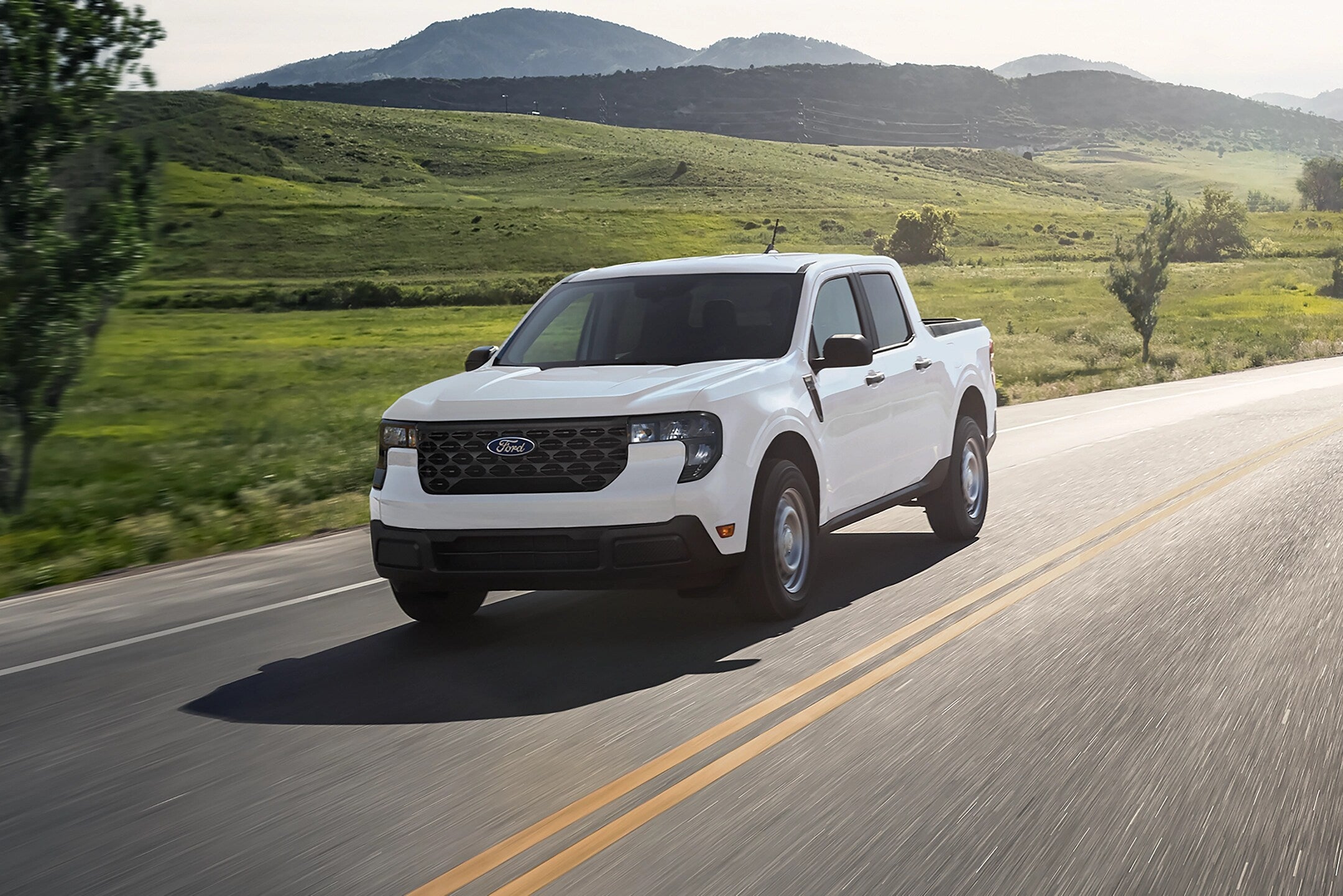 Photo of a 2025 Ford Maverick driving on the road